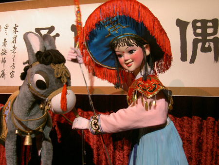 nwpuppetcenter-imagesofchina-woman-donkey The Donkey's Best Friend